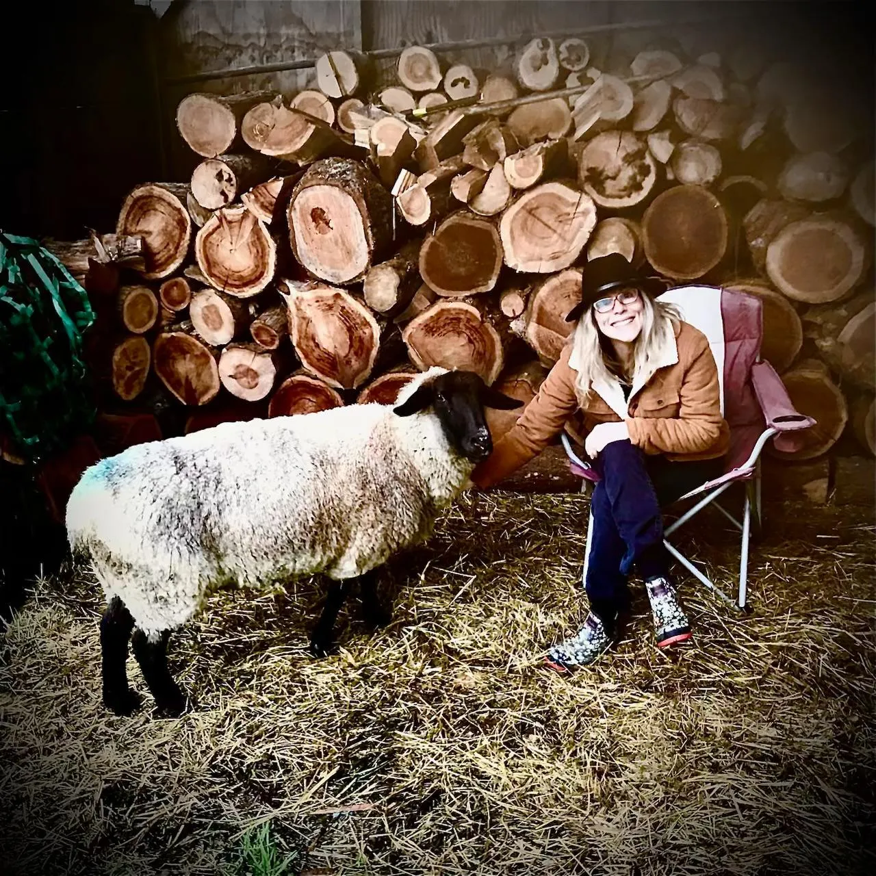 Julie with one of the sheep at Blue Rock Ranch