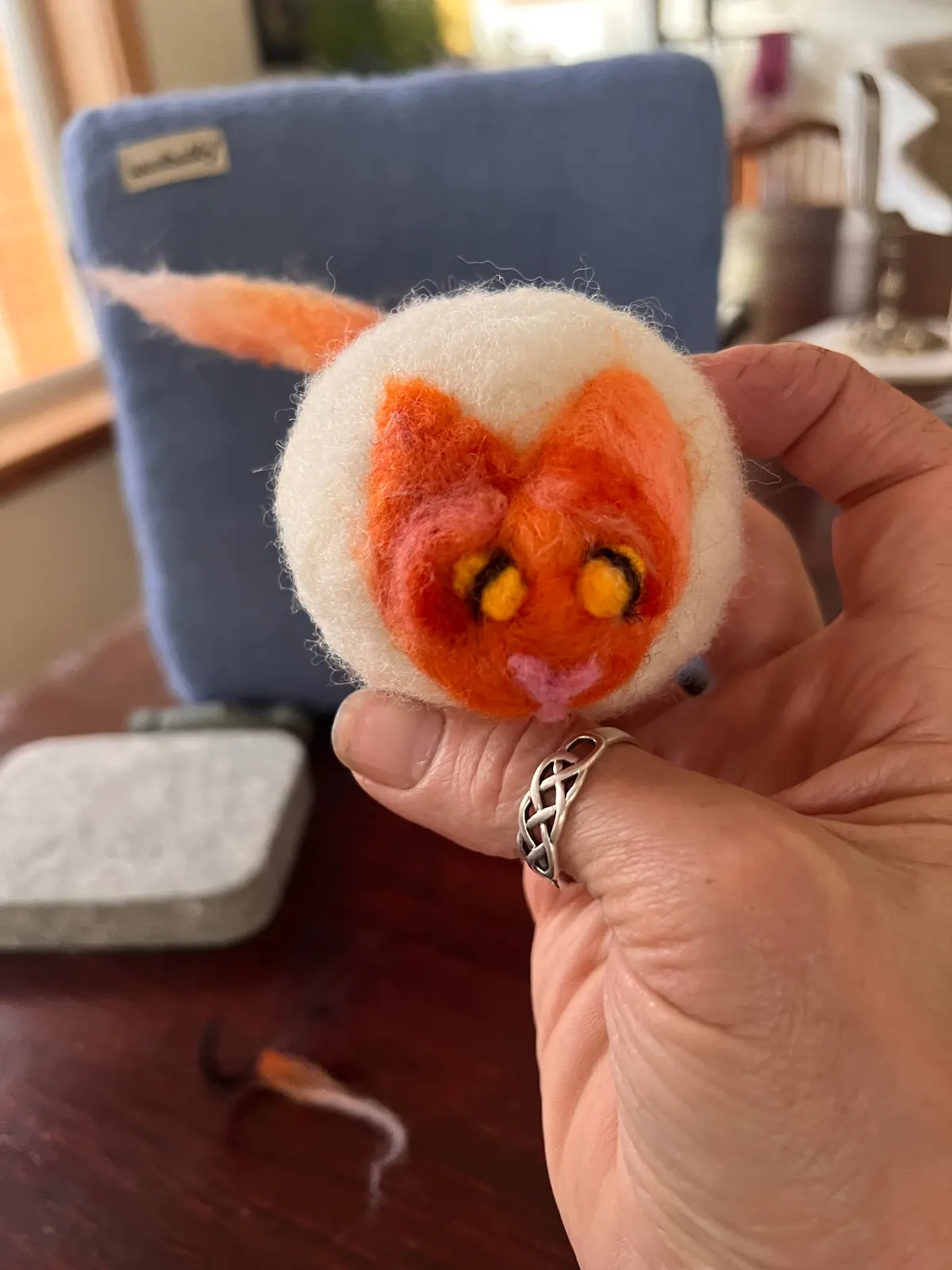 cat face on a dryer ball